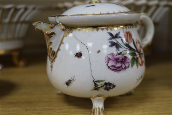 A 19th century Meissen jug and cover, cracked, 12.5cm., a Berlin gilt porcelain basket, another similar basket